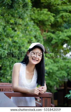 Portrait of thai teen beautiful girl happy and relax