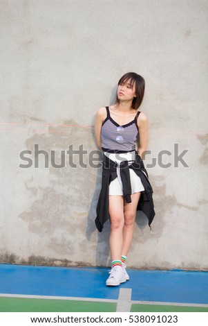 Portrait of Thailand Asian teen Pretty girl in sport