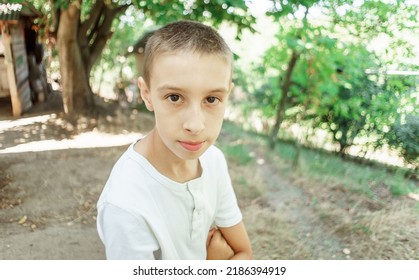 Portrait Of A Thin Boy Outside