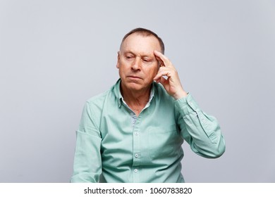 Portrait of a thinking elderly man