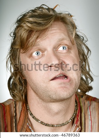 Portrait of thinking fun man