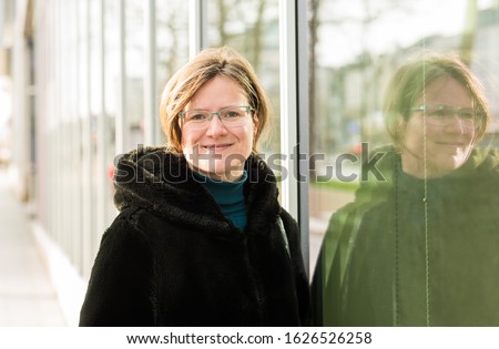 Image, Stock Photo happy twin sisters stand on a bridge in Erfurt and laugh into the camera