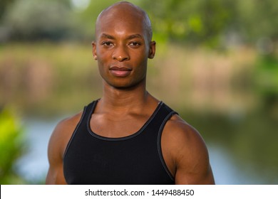 Portrait of a thirty year old fitness model. Lit with off camera flash - Powered by Shutterstock