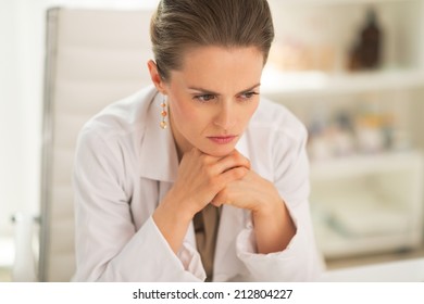 Portrait Of Thoughtful Doctor Woman