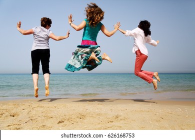 Portrait Of Three 40 Years Old Women On Seaside