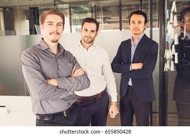 Portrait Of Three Businessmen In Office 1