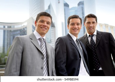 Portrait Of Three Businessmen Smiling