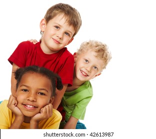 Portrait of three children looking at camera over white background