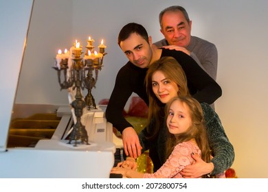 Portrait Of Three Generation Family, Happy Family Members Hugging, Looking At Camera