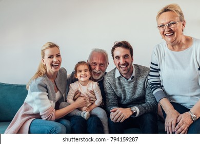 Portrait Of A Three Generation Family Spending Time Together