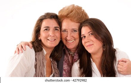 Portrait of Three generations of women of the same family isolated in white