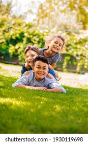 Portrait Of Three Little Children As A Tower