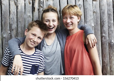Portrait of three siblings