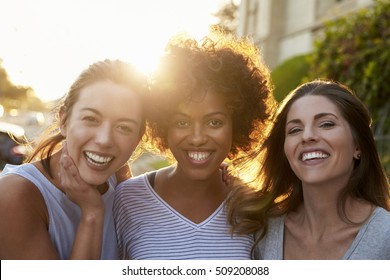 Portrait Of Three Young Adult Female Friends In The Street