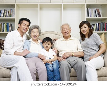 Portrait Of A Three-generation Asian Family.