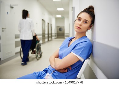 Portrait of tired doctors after long day at work  - Powered by Shutterstock