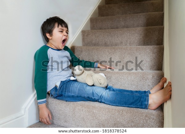 Portrait Tired Kid Yawning Sitting On Stock Photo 1818378524 Shutterstock