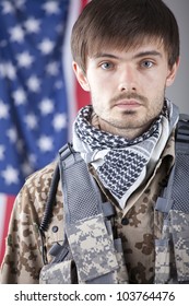 Portrait Of Tired Soldier Over American Flag