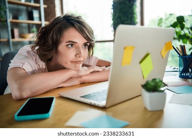 Portrait of tired young woman business entrepreneur folded arms watching not interesting extra courses job duties isolated loft background
