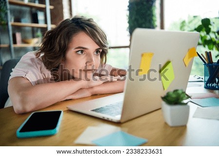 Portrait of tired young woman business entrepreneur folded arms watching not interesting extra courses job duties isolated loft background