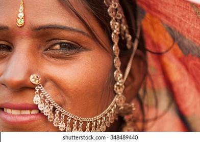 Portrait Of Traditional Indian Woman In Sari Costume Covered Her Head With Veil, India People.