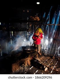 Portrait Of Traditional Palm Sugar Making In A Smoky Kitchen, East Java 2 December 2020