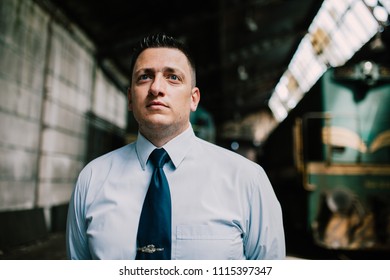 Portrait of a train driver