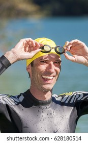 Portrait Of Triathlete At The Lake