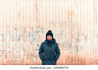 Portrait Of Troubled Uptight Woman On The Street On Cold Winter Day Looking At Camera