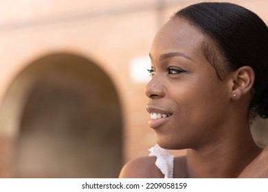 Portrait Of Turist Woman Dressed In White Getting To Know Europe, Ferrara. Italy