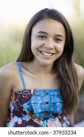 Portrait Of Tween Girl Smiling To Camera