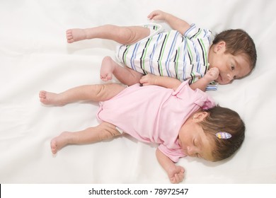 Portrait Of Twin Babies Boy And Girl