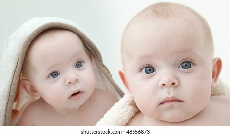 Portrait Of Twin Sisters Arguing.