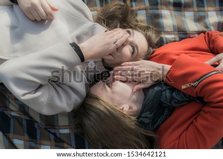 Similar – Image, Stock Photo happy twin sisters stand on a bridge and look up