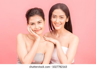 Portrait of two beautiful women beauty health care.beauty and spa.perfect fresh skin on pink background - Shutterstock ID 1027782163