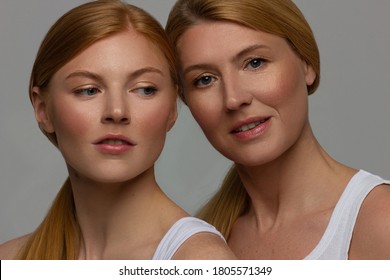 Portrait Of Two Beautiful Women With Fresh Daytime Daily Makeup With Radiant Skin, Gentle Face Care, Highlighter And Natural Lip Gloss. Anti-aging Concept, Cosmetology And Spa