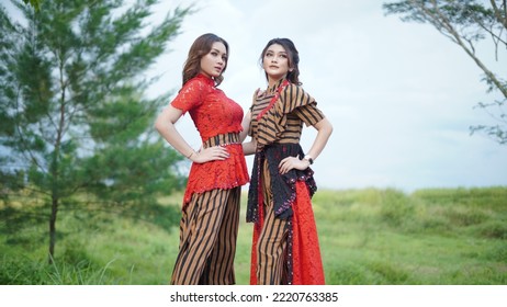 Portrait of two beautiful women in nice and beautiful clothes - Shutterstock ID 2220763385