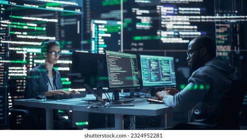 Portrait of Two Diverse Developers Working on Computers, Typing Lines of Code that Appear on Big Screens Surrounding Them. Male and Female Programmers Creating Innovative Software, Fixing Bugs.