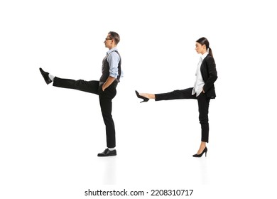 Portrait Of Two Employees, Office Workers Moving Forward To Success, Posing Isolated Over White Background. Concept Of Business, Office Lifestyle, Success, Ballet, Career, Expression, Ad