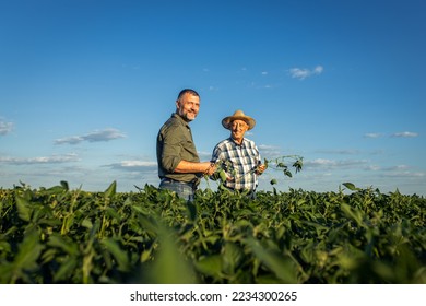 Portrait of two farmers in a soy field. - Shutterstock ID 2234300265
