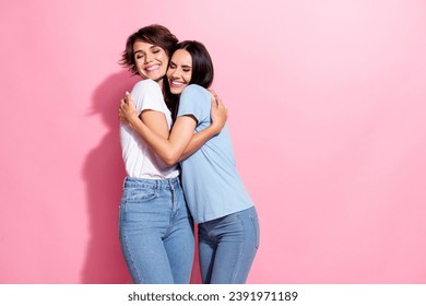 Portrait of two funky girls hugs together lovers perfect match lesbians carefree support sweetheart isolated on pink color background - Powered by Shutterstock