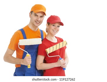 Portrait Of Two Male And Female House Painter Worker With Painting Roller Isolated