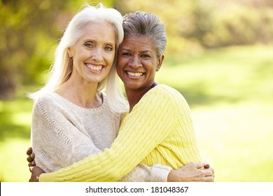 Portrait Of Two Mature Female Friends Hugging