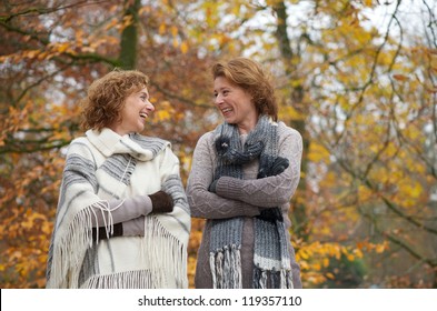 Portrait Of Two Older Women Smiling Outdoors