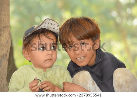 Similar – Mother with her seven year old daughter laughing in a cabin in the countryside