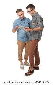portrait of two young  man looking at a tablet pc, isolated over white background