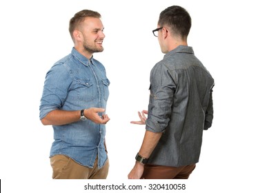 portrait of two young  man talking to each other, isolated over white background