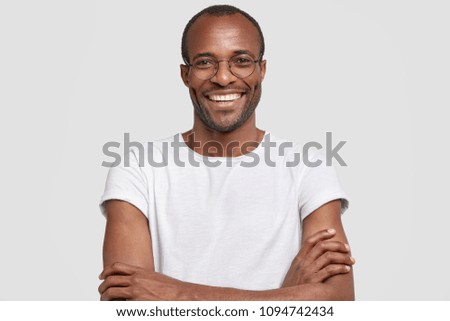 Similar – Image, Stock Photo adult man in black clothes stands upright with strained muscles