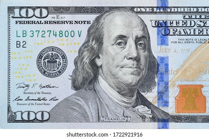 Portrait Of US President Benjamin Franklin On 100 Dollars Banknote Closeup Macro Fragment. United States Hundred Dollars Money Bill