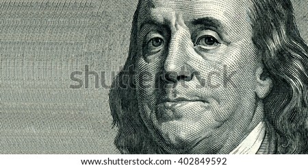 Portrait of U.S. statesman, inventor, and diplomat Benjamin Franklin as he looks on one hundred dollar bill obverse. The portrait is expanded from the right side